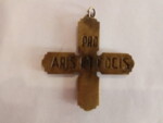 Bronze crucifix produced in Mallorce in 1936. It was given to people who had donated gold, jewels and iron to Franco's cause. It reads "I love Spain" followed by the date of the military coup. On the back it reads. "Pro aris et focis" Latin meaning "For Alter and Hearth" or "For God and home".